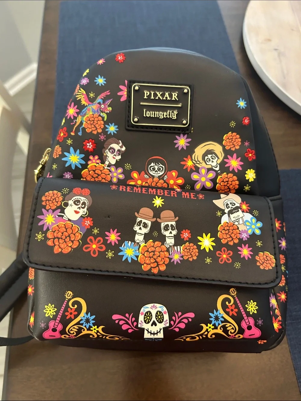 Loungefly Pixar Coco Black Floral Mini Backpack